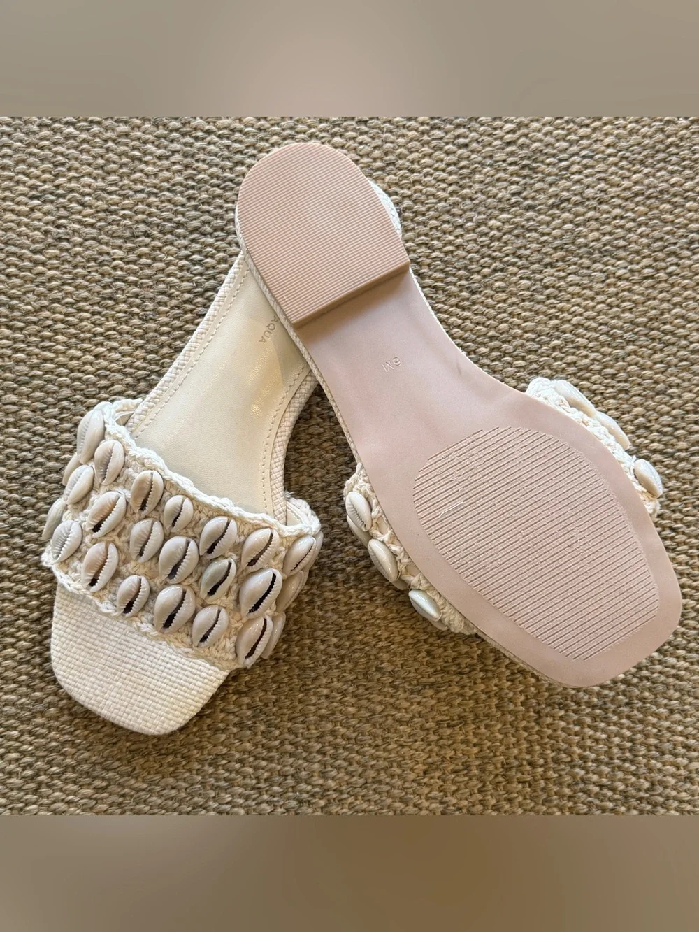 Aqua x The White Lotus collab shell sandals